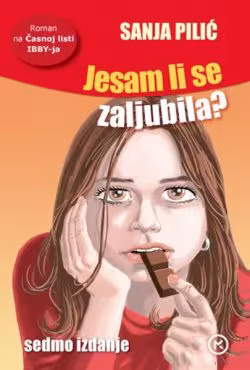 A girl with the long brown hair is thoughtfully nibbling a piece of chocolate.