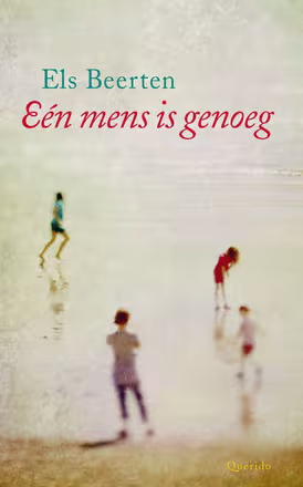 A couple of young people are standing on the beach